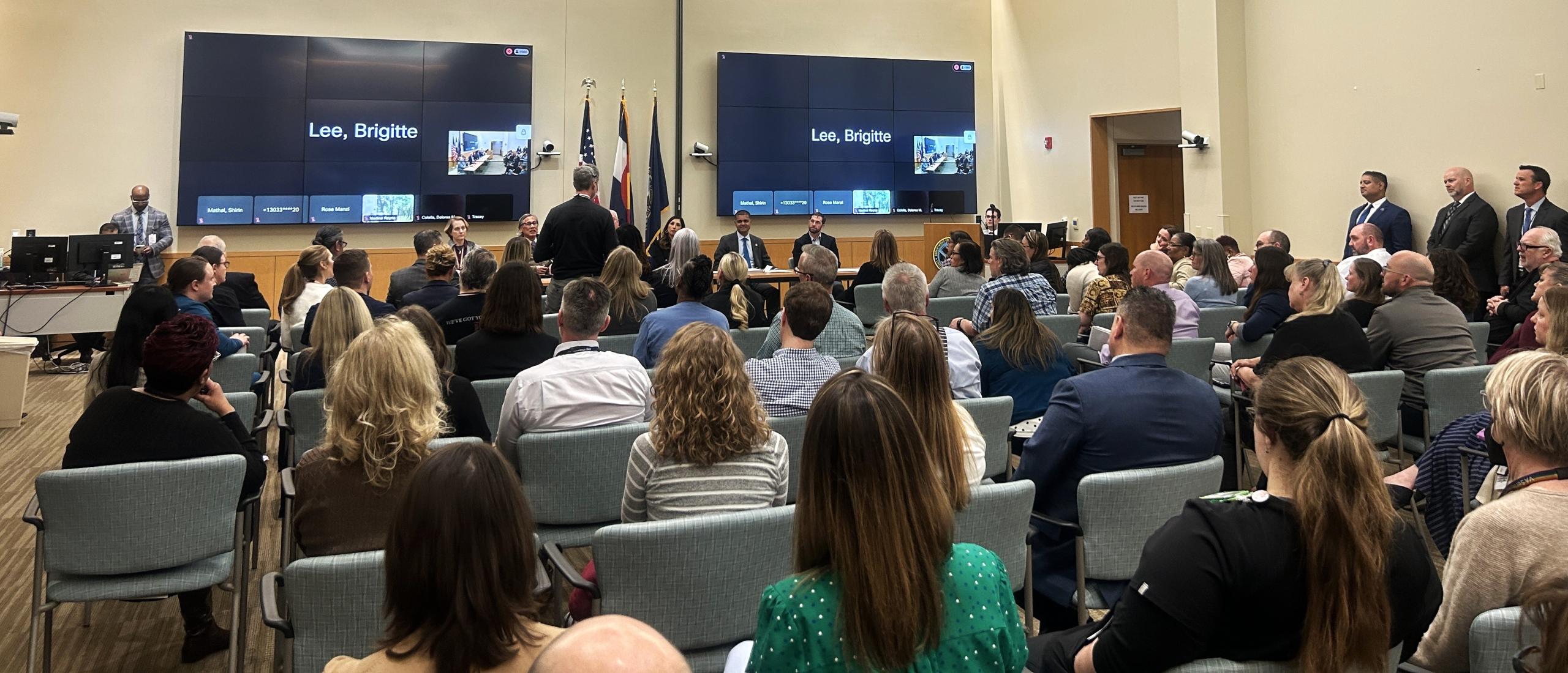 Rep. Crow and Dr. Shereef Elnahal, VA Under Secretary for Health, with VA ECHS employees. 
