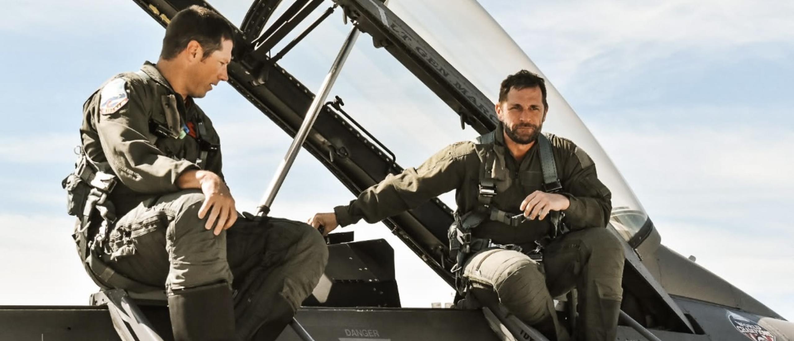 Soldiers sitting on an airplane