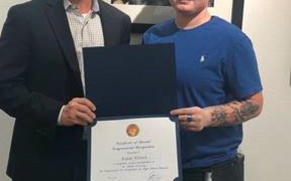 Rep. Crow with art competition winner