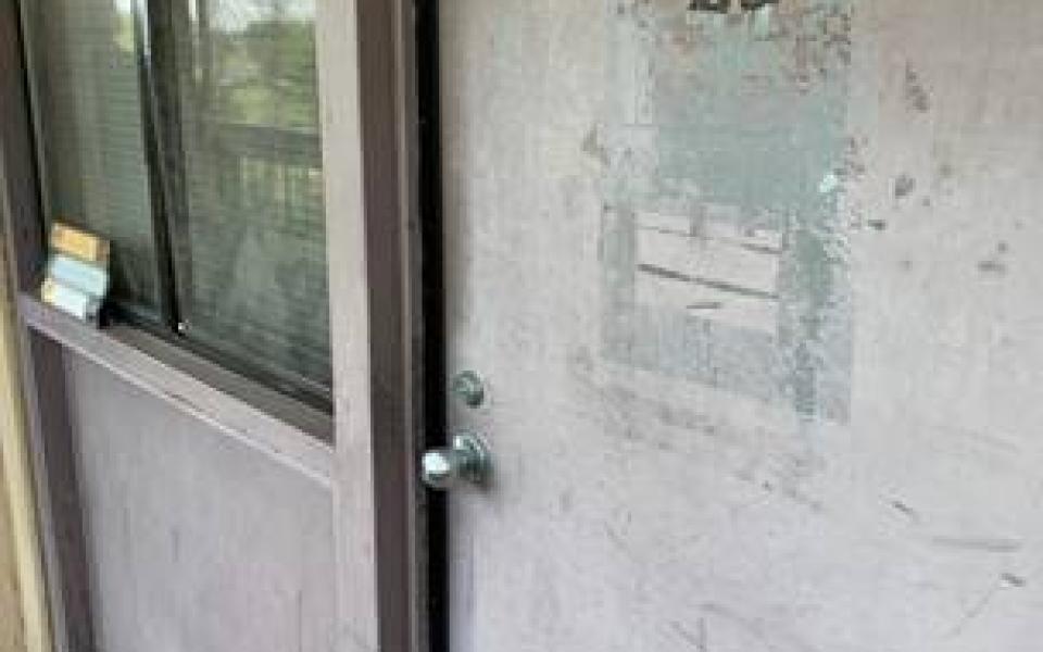 Photos taken by Rep. Jason Crow of poor conditions during post tour, including broken chairs in a classroom and occupied soldier housing