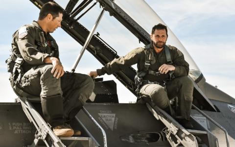 Soldiers sitting on an airplane