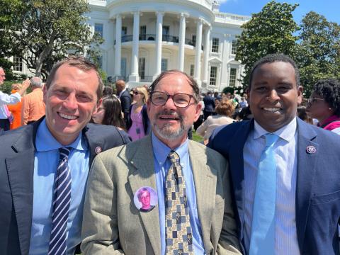 Congressmen Crow & Neguse pose with Tom Mauser, father of Daniel Mauser, a Columbine victim, at the White House