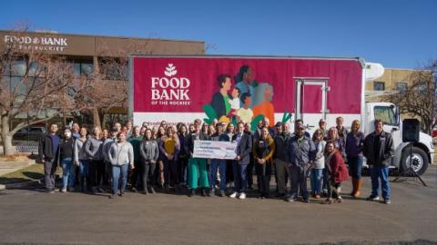 Rep. Crow with Food Bank of the Rockies staff members and volunteers.
