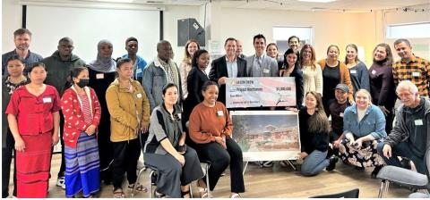 Rep. Crow with Project Worthmore Executive Director Frank Anello, Managing Director Erika Bodor, staff, volunteers, and community members.