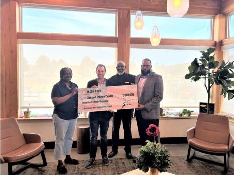 Rep. Crow with Second Chance Center Founder Hassan Latif, Executive Director Khalil Halim, and PATH Director of Resident Services Wanda Harrison.