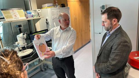 Congressman Crow in a Lab